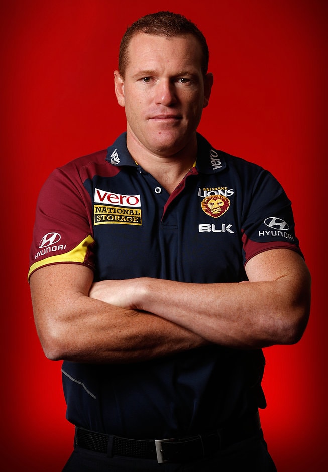 AFL 2015 Portraits - Justin Leppitsch Justin Leppitsch, Senior Coach of the Lions poses for a photograph during a 2015 AFL.com.au photo shoot at AFL House, Melbourne on March 26, 2015. (Photo: Michael Willson/AFL Media)